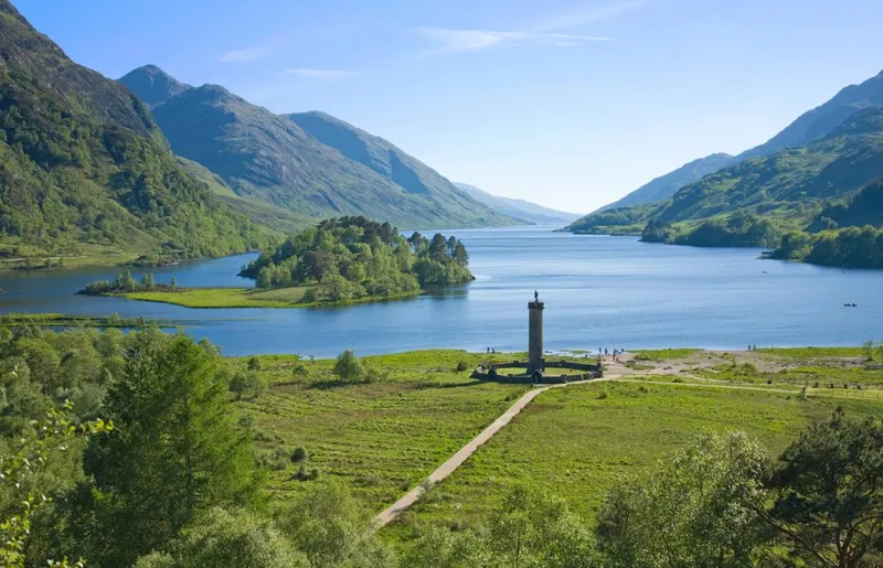 Small group photographing the Glenfinnan Viaduct above Loch Shiel on a Glenfinnan small group tour from Edinburgh, Scottish Highlands