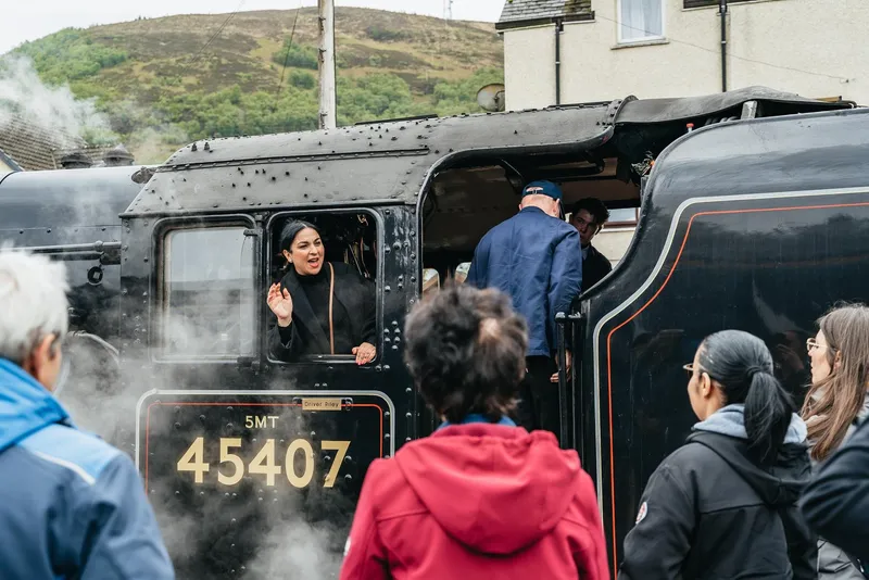 The Glenfinnan Viaduct with the Jacobite Steam Train and Harry Potter scenery on a Harry Potter steam train tour from Edinburgh, Scotland